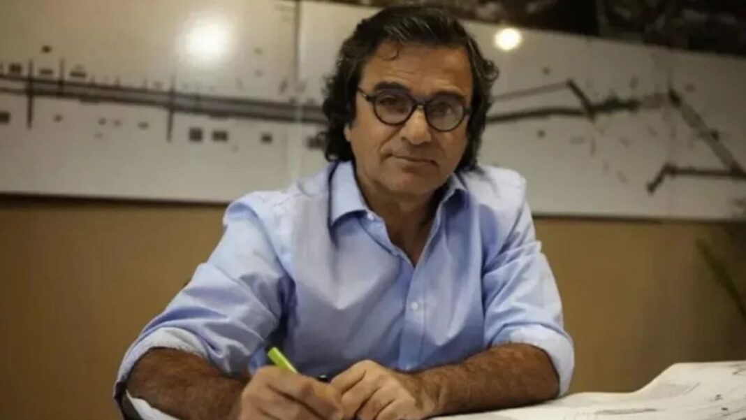 Luis Caputo y Carlos María Frugoni en un acto oficial