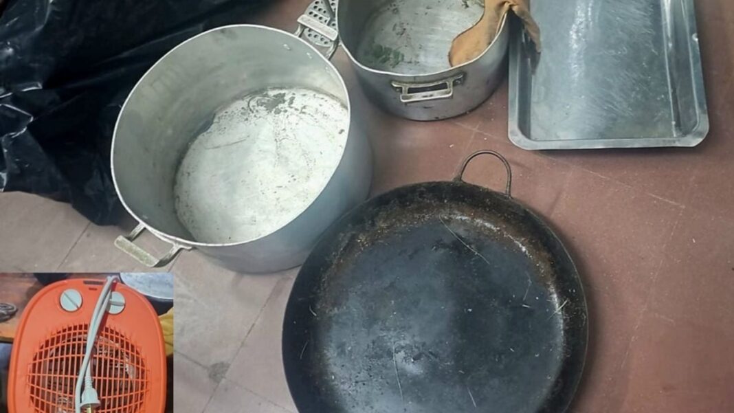 Ilustración de un comedor comunitario con utensilios de cocina sobre una mesa